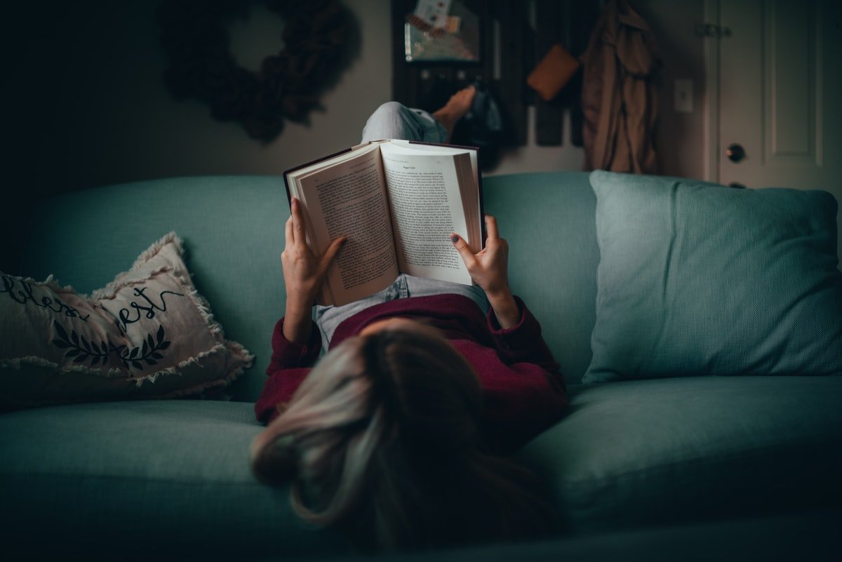 woman-reading-on-couch